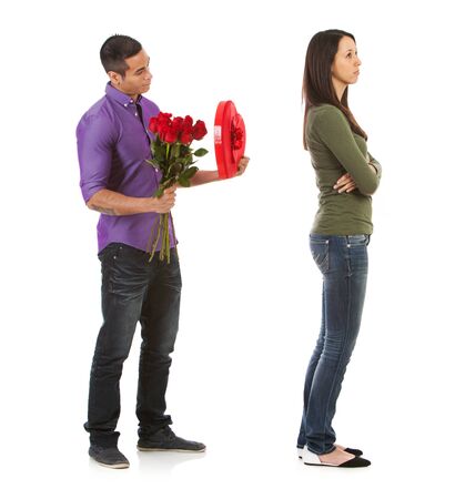 Man and woman in various Valentine's Day themed poses, isolated on white.の写真素材