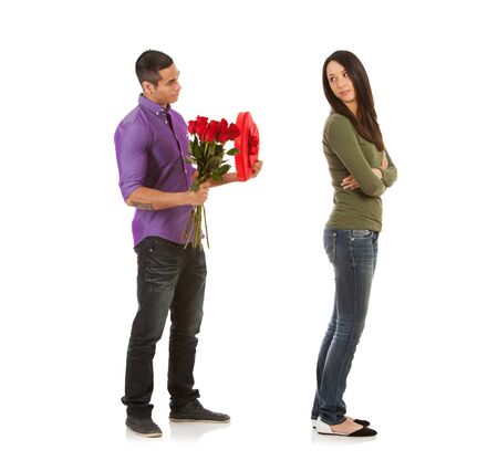 Man and woman in various Valentine's Day themed poses, isolated on white.の写真素材