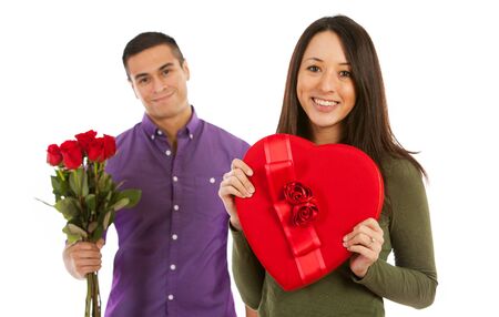 Man and woman in various Valentine's Day themed poses, isolated on white.の写真素材