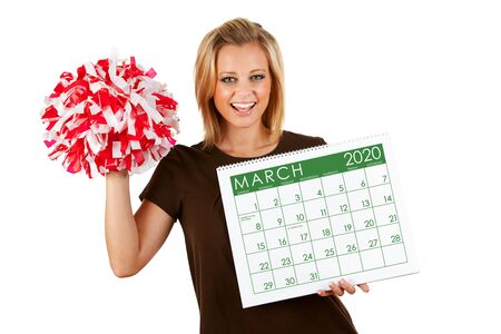 Cute series with a Caucasian woman holding a calendar for different times of the year.の写真素材