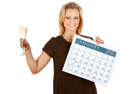 Cute series with a Caucasian woman holding a calendar for different times of the year.の写真素材