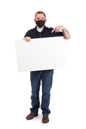 Adult male wearing a face mask during the Covid pandemic, isolated on white.の写真素材