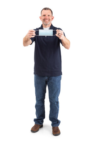 Adult male wearing a face mask during the Covid pandemic, isolated on white.の写真素材