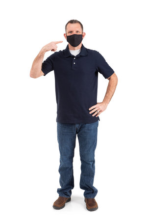 Adult male wearing a face mask during the Covid pandemic, isolated on white.の写真素材