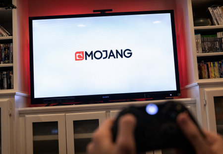 Modern, popular media and games being viewed on a large screen television through an Xbox One.のeditorial素材