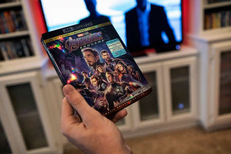 Modern, popular media and games being viewed on a large screen television through an Xbox One.のeditorial素材