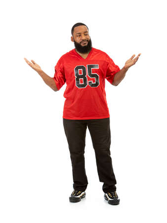 An African American man in a football team jersey in various poses.の写真素材