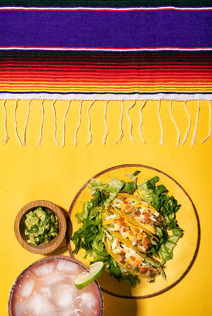 Series with food, drinks and other items to make a festive background for Cinco De Mayo.  Includes a colorful margarita.の写真素材