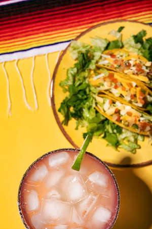 Series with food, drinks and other items to make a festive background for Cinco De Mayo.  Includes a colorful margarita.の写真素材