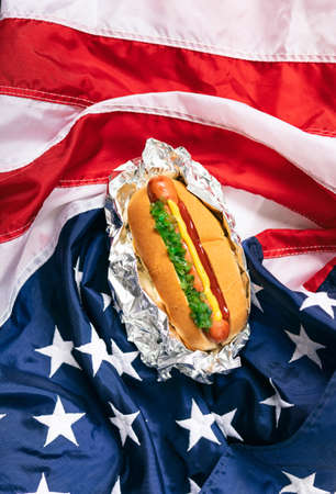 Image with copyspace, good for baseball or summer themed design and advertising. Includes American flag.の写真素材