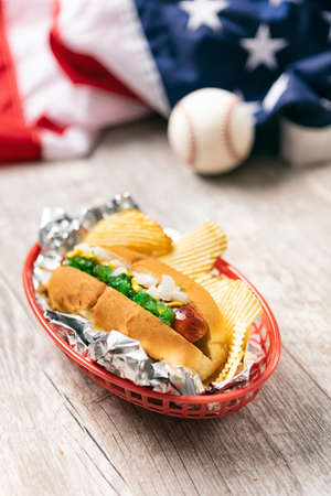 Image with copyspace, good for baseball or summer themed design and advertising. Includes American flag.の写真素材