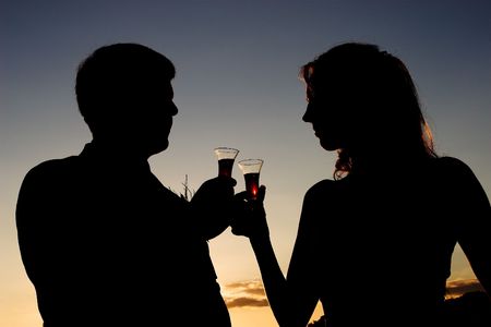 A newlywed couple toasting their unionの写真素材