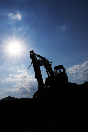 Backactor busy excavatingの写真素材