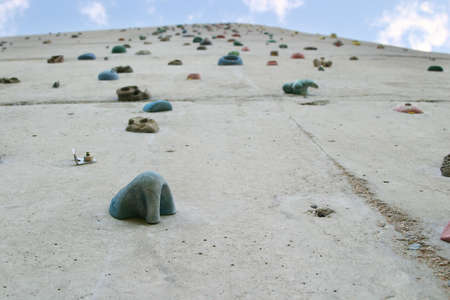 Climbing wall with gripsの写真素材