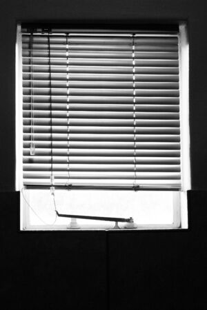 Kitchen window with blindsの写真素材