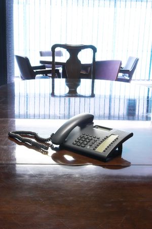 PABX Telephone on boardroom tableの写真素材