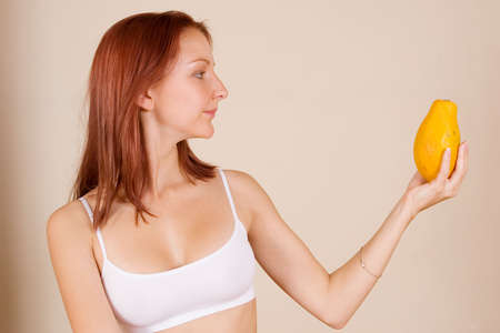 Woman holding a paw-pawの写真素材