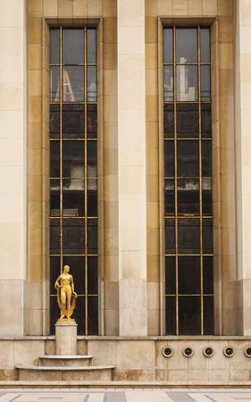 An old building with golden statues in Paris, France.の写真素材