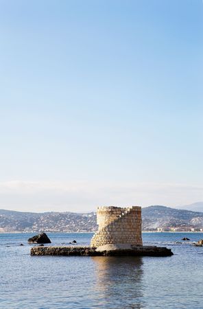 Ruins surrounded by water in Antibes, France.  Copy space.の写真素材