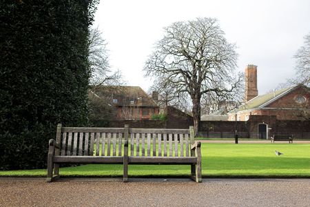 Bench in a park at wintertime.の写真素材