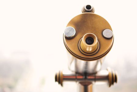 Pay Telescope on the second level of the Eiffel Tower looking out over the Champs de Mars  Shallow DOF  Gloomy winters day, background out of focus. copy space.の写真素材
