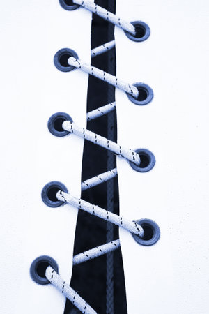 Close-up of a sail on a yacht.  Shallow depth of field.  Blue tone.の写真素材