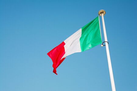 Italian Flag blowing in the windの写真素材