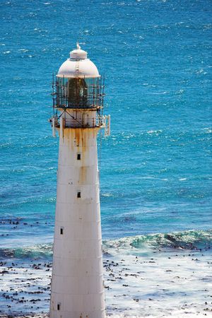 The Slangkop Lighthouse at Kommetjie, Western Cape. The Tallest Lighthouse in South Africaの写真素材