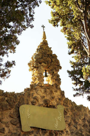Old church bell and spire on the city wall of Saint Paul de Vence, Franceの写真素材