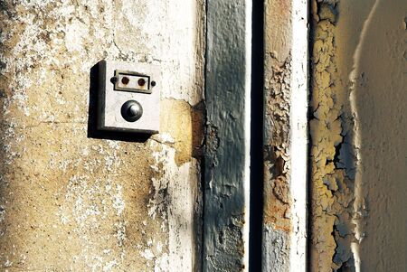 Old doorbell against a wall.  Copy space.の写真素材