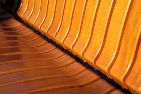 Yellow color wooden bench texture.  Copy space.の写真素材
