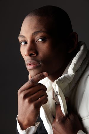 Young black african businessman in a formal suite - high contrastの写真素材