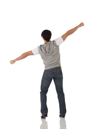 Single Caucasian male tap dancer wearing jeans showing various steps in studio with white background and reflective floor. Not isolatedの写真素材