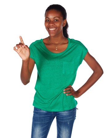 Beautiful black african young adult woman casually dressed in an emerald green t-shirtの写真素材