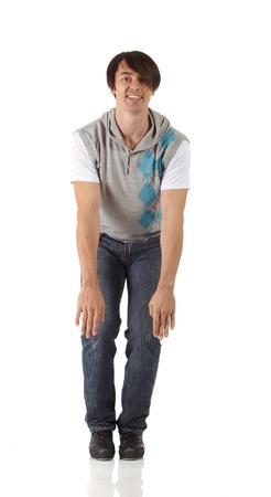 Tap dancer in blue jeans and tap shoes doing steps on a white background and floorの写真素材