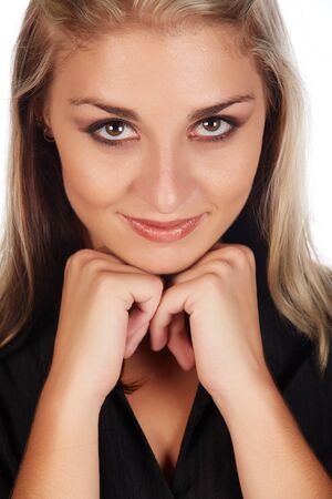 Portrait of a beautiful and sexy young adult caucasian businesswoman with honey blonde hair and brown eyes with natural make-upの写真素材