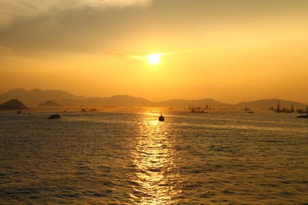 hong kong skyline at sunsetの写真素材
