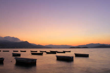 sunset of boatの写真素材