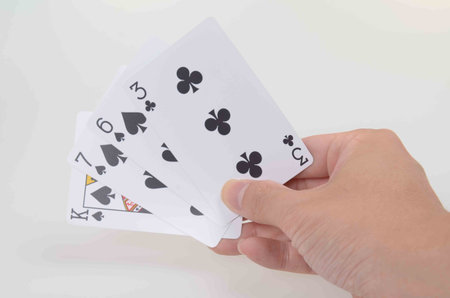 Hands Holding Playing Cards