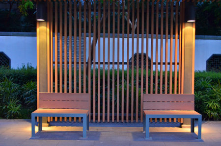 sitting in a park on a bench
