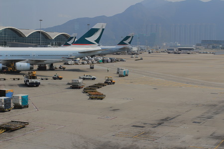 Preparing of airplane for flight in Hong Kong International Airportのeditorial素材