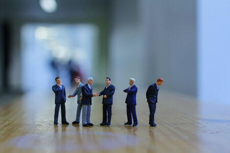 a small figures of business meeting