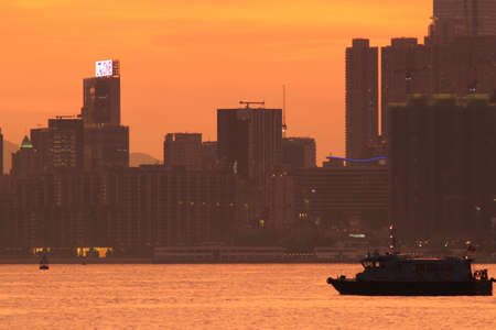 City at sunset along the coastのeditorial素材