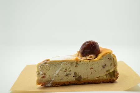 Cheesecake isolated on white backgroundの写真素材