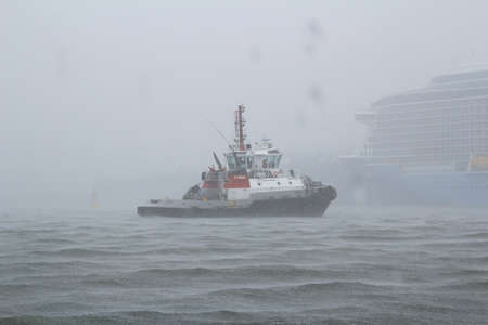 a storm on the sea with rain downpourのeditorial素材