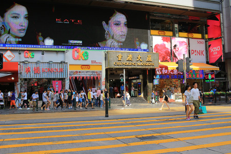 People crossing Street near Chungking Mansions, Nathan Road, Hong kong, Chinaのeditorial素材