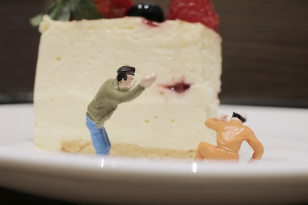 the Group of of tiny miniature artisans working togetherの写真素材