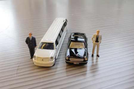 The business man with white limosine carの写真素材