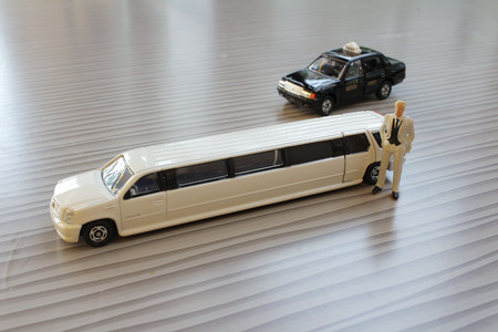The business man with white limosine carの写真素材