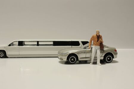 a small figure with the toy carの写真素材